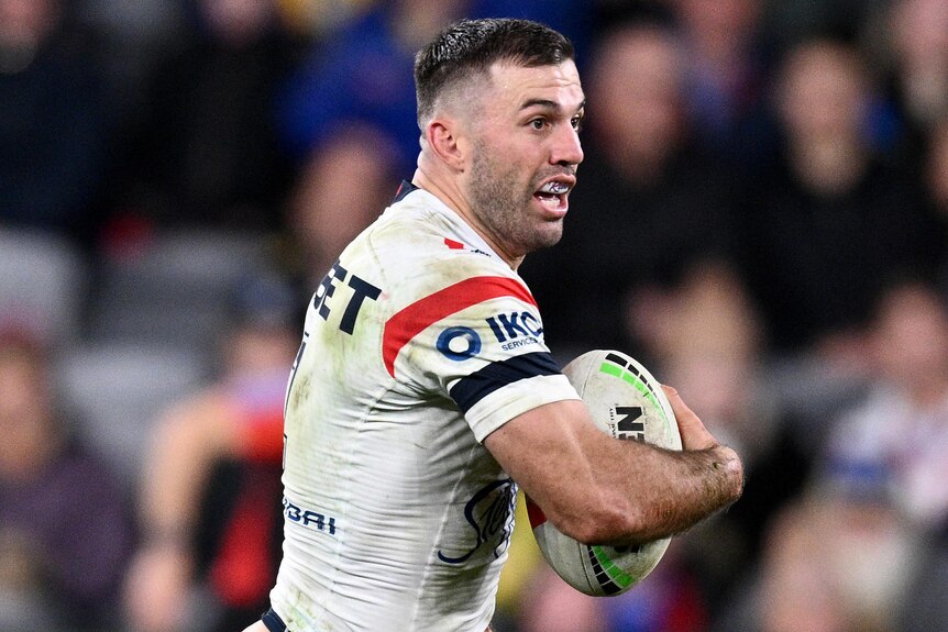 James Tedesco runs the ball for the Roosters against the Eels.