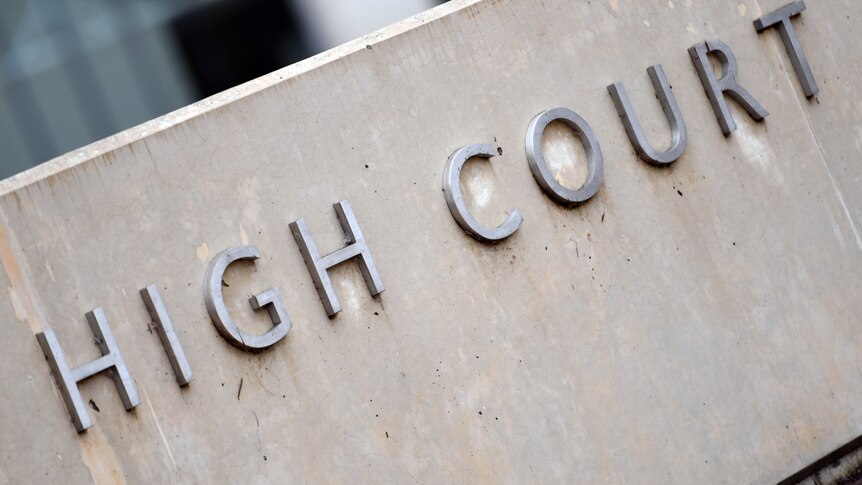 Close up of "high court' sign at the High Court of Australia in Canberra.