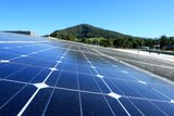 A close-up of solar panels on top of a house