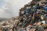 A mountain of clothing in a landfill site in Ghana's capital Accra.