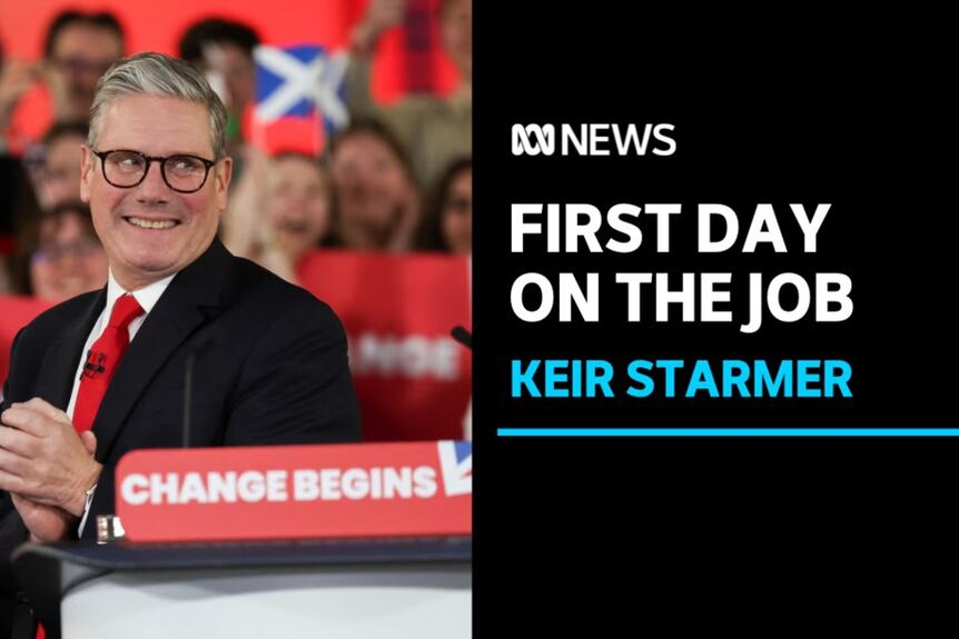 First Day on the Job, Keir Starmer: Keir Starmer smiling at a lecturn at a Labour campaign event.