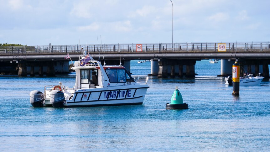 A maritime boat in a lake. 