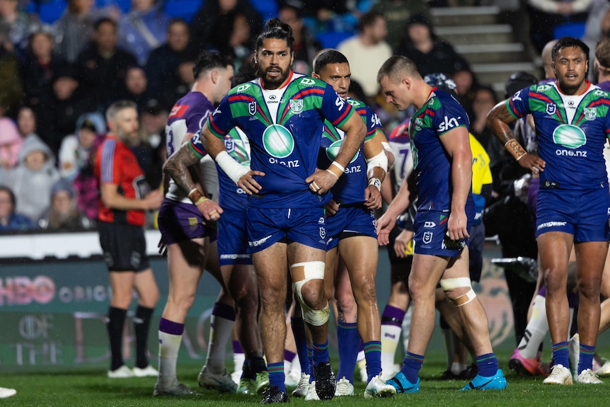 NRL Warriors captain Tohu Harris with his hands on his hips, looking upset after his team lose