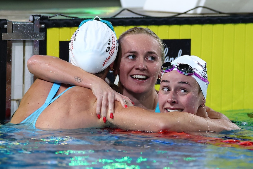 Ariarne Titmus is hugged