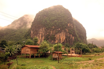 The hilly landscape on the country road 12 between the city of Tha Khaek and the village of Mahaxai Mai in central Laos on the border with Thailand in South East Asia.