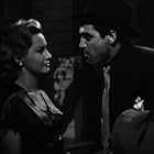 Steve Cochran and Virginia Mayo in White Heat (1949)