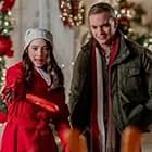 Natalie Dreyfuss and Marshall Williams in Fixing Up Christmas (2021)