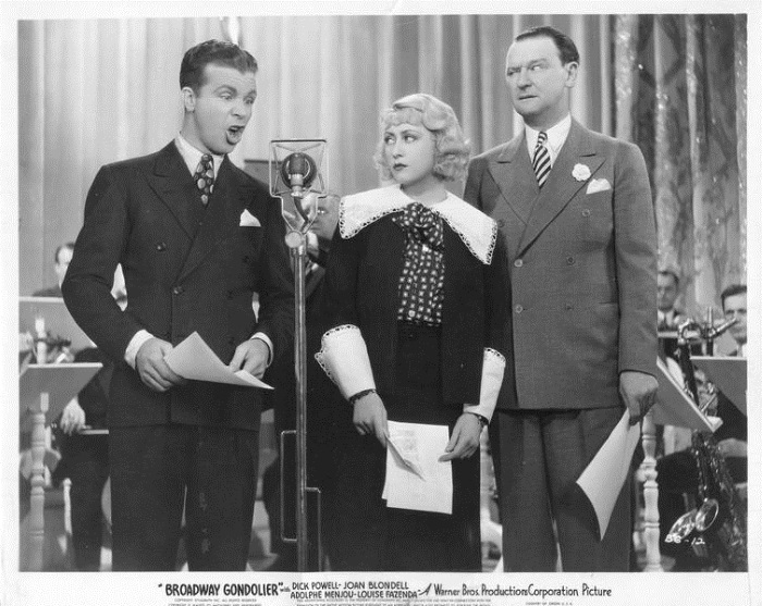 Joan Blondell, James Burke, and Dick Powell in Broadway Gondolier (1935)