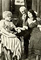 Jane Fearnley, Charles Herman, and Gertrude Robinson in When the Heart Calls (1912)