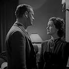 Jane Barrett and Robert Wyndham in The Captive Heart (1946)