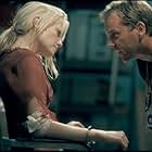 Kiefer Sutherland and Laura Harris in 24 (2001)