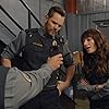 Joel McHale, Ravi Patel, and Grace Palmer in Animal Control (2023)