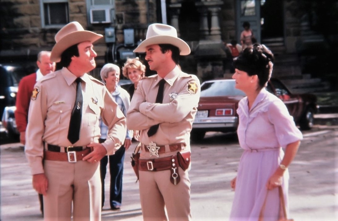 Burt Reynolds, Jim Nabors, and Mary Louise Wilson in The Best Little Whorehouse in Texas (1982)