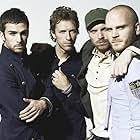 Coldplay, Chris Martin, Guy Berryman, Jon Buckland, and Will Champion