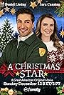 Daniel Lissing and Sara Canning in A Christmas Star (2021)