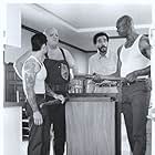 Richard Pryor, King Kong Bundy, Ji-Tu Cumbuka, and Robert LaSardo in Moving (1988)