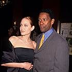 Denzel Washington and Angelina Jolie at an event for The Bone Collector (1999)