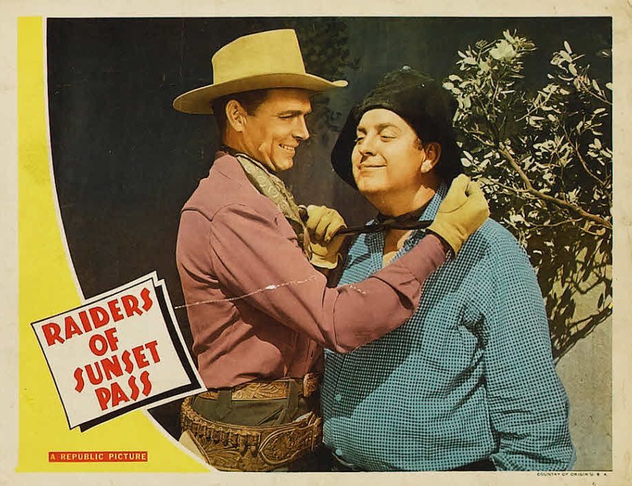 Smiley Burnette and Eddie Dew in Raiders of Sunset Pass (1943)