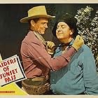 Smiley Burnette and Eddie Dew in Raiders of Sunset Pass (1943)