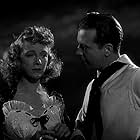 Claire Dodd and Dick Powell in In the Navy (1941)