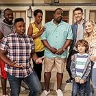 Tichina Arnold, Cedric The Entertainer, Max Greenfield, Sheaun McKinney, Beth Behrs, Marcel Spears, and Hank Greenspan in The Neighborhood (2018)
