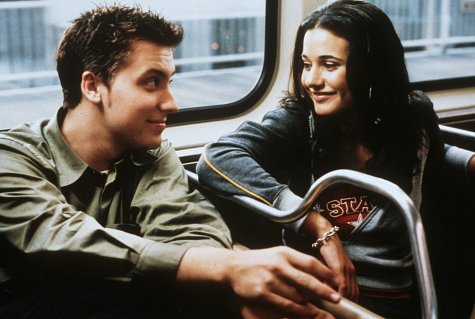 Lance Bass and Emmanuelle Chriqui in On the Line (2001)