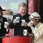 The Priest doing STARBUCKS holy water with his buddies.