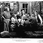 Henry Fonda, Jane Darwell, Dorris Bowdon, Frank Darien, Darryl Hickman, Shirley Mills, Russell Simpson, and O.Z. Whitehead in The Grapes of Wrath (1940)