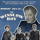 Robert Donat, Cedric Hardwicke, Margaret Leighton, and Jack Watling in The Winslow Boy (1948)