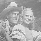 Joan Barton and Ken Curtis in Lone Star Moonlight (1946)