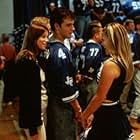 James Van Der Beek, Ali Larter, and Amy Smart in Varsity Blues (1999)