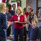 Rebecca Staab, Jessy Schram, and Cardi Wong in Road to Christmas (2018)