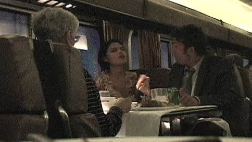 A couple fight during dinner aboard an Amtrak train from Los Angeles to New York City.