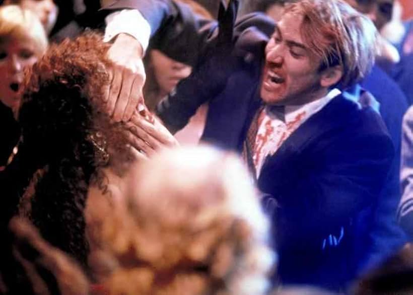 Nicolas Cage and Jennifer Beals in Vampire's Kiss (1988)