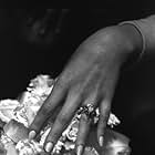 Beverly Adams showing her ring on her wedding day to Vidal Sassoon