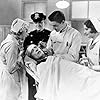 Joan Blondell, Barbara Stanwyck, James Bradbury Jr., Jim Farley, Walter McGrail, and Edward J. Nugent in Night Nurse (1931)