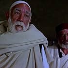 Anthony Quinn, Robert Brown, and Takis Emmanuel in The Lion of the Desert (1980)