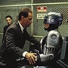 Peter Weller, Miguel Ferrer, Stephen Berrier, and Sage Parker in RoboCop (1987)