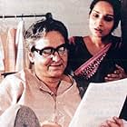 Soumitra Chatterjee, Dipankar Dey, and Mamata Shankar in The Stranger (1991)