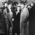 Orson Welles, Billy House, Philip Merivale, Martha Wentworth, and Loretta Young in The Stranger (1946)