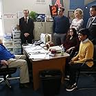 Anjali Bhimani, Julie Bowen, Ty Burrell, Andy Daly, Ajay Mehta, Eric Stonestreet, Ariel Winter, and Suraj Partha in Modern Family (2009)