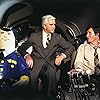 Leslie Nielsen, Robert Hays, and Otto in Airplane! (1980)