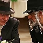 Reb Hershel and Reb Shimon share some thoughts at the Purim party.