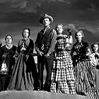 Robert Taylor, Julie Bishop, Denise Darcel, Beverly Dennis, Marilyn Erskine, Lenore Lonergan, and Renata Vanni in Westward the Women (1951)