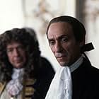 Salieri (F. MURRAY ABRAHAM) with Baron Van Swieten (JONATHAN MOORE, in background)