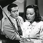 Toshirô Mifune and Shirley Yamaguchi in Scandal (1950)