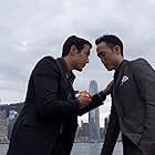 Darren E. Scott and Derek Ting in Supercapitalist (2012)