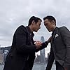 Darren E. Scott and Derek Ting in $upercapitalist (2012)