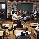 Aleisha Allen, Jack Black, Cole Hawkins, Angelo Massagli, Kevin Alexander Clark, Miranda Cosgrove, Joey Gaydos Jr., Maryam Hassan, Rivkah Reyes, Caitlin Hale, Veronica Afflerbach, Jordan-Claire Green, Robert Tsai, Brian Falduto, Z Infante, James Hosey, and Jaclyn Neidenthal in School of Rock (2003)