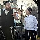 Menashe Lustig and Yoel Falkowitz in Menashe (2017)